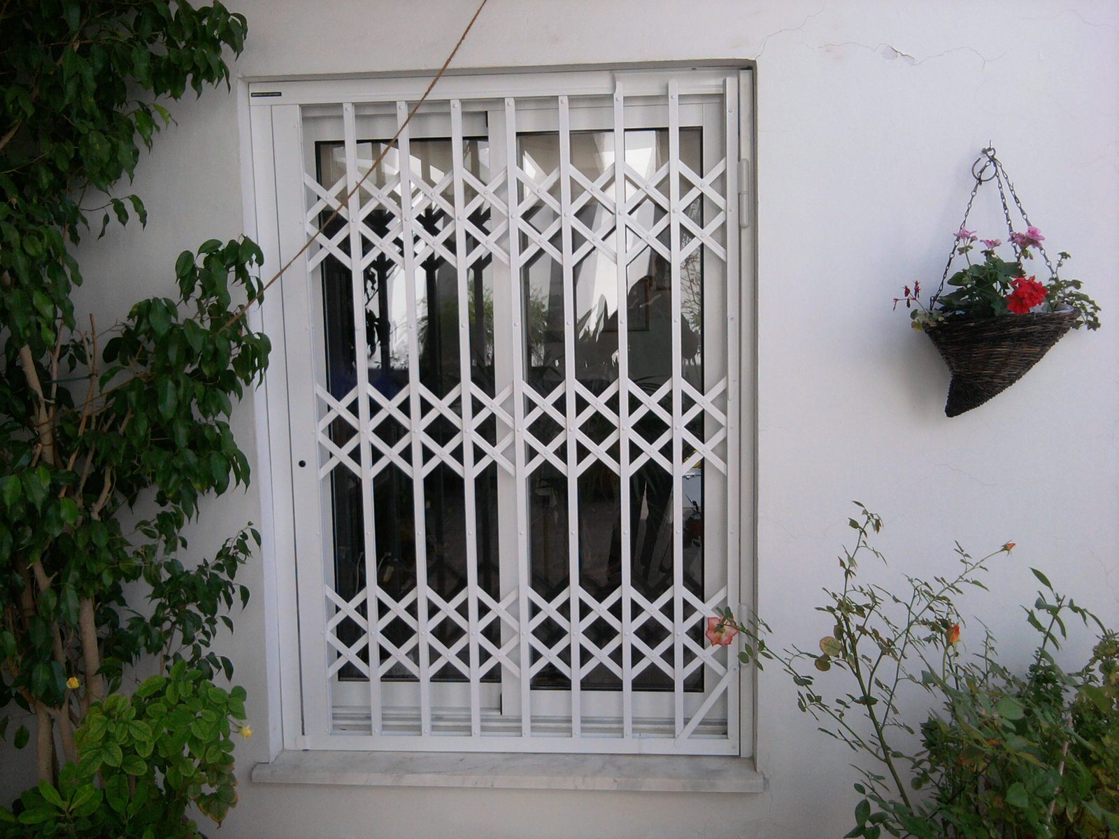Decorative grille over a window opening