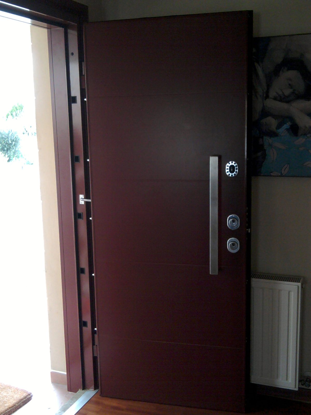 Multi-point lock engaged, door open