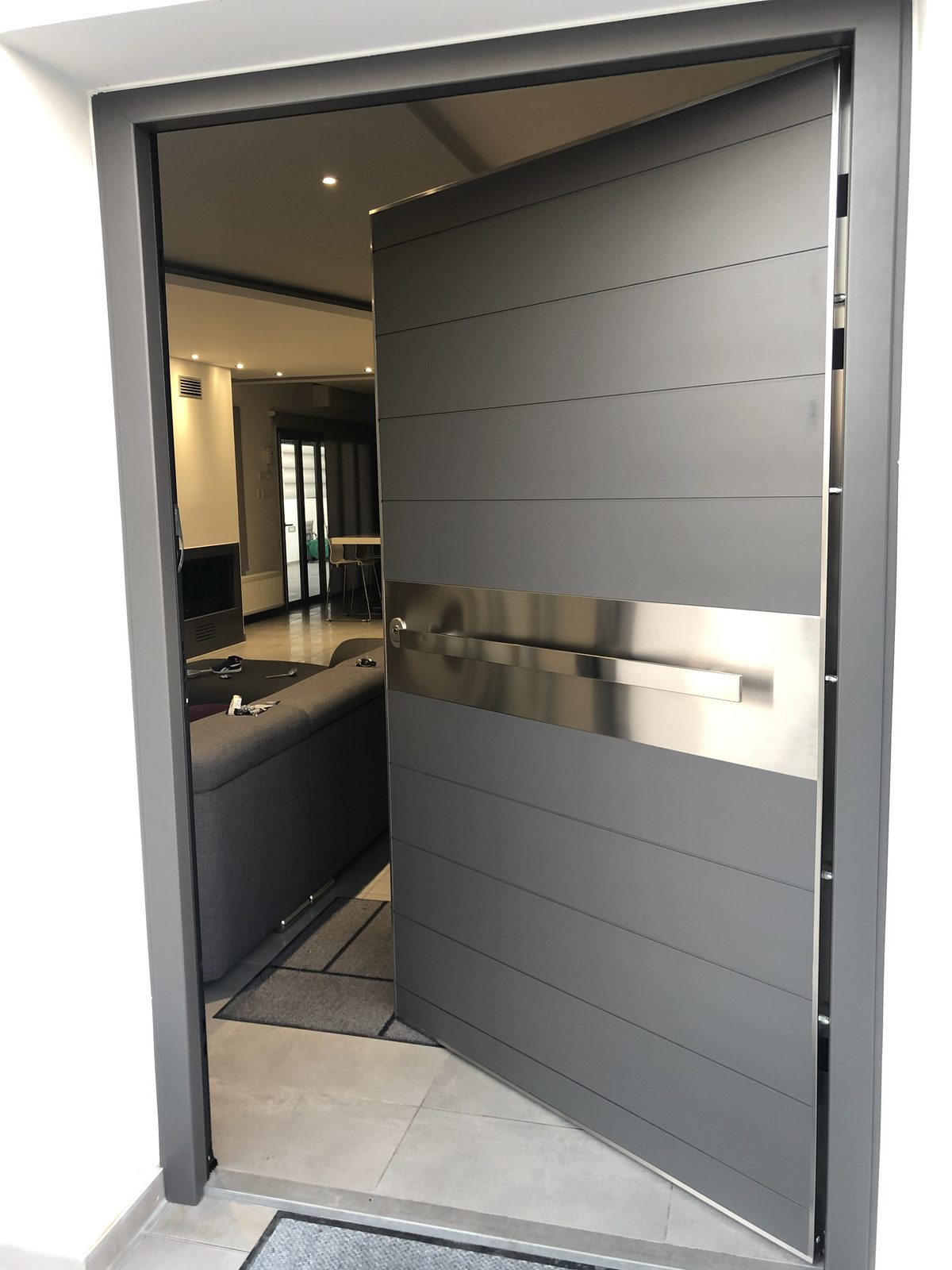Oversized pivot door, open